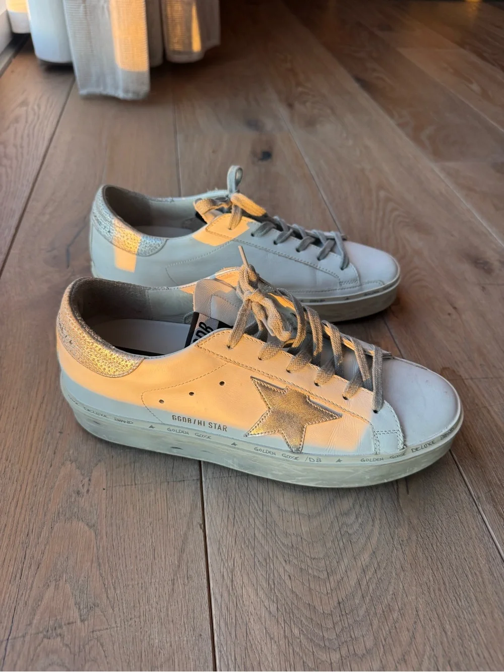Golden Goose Hi Star with silver star and metallic silver heel